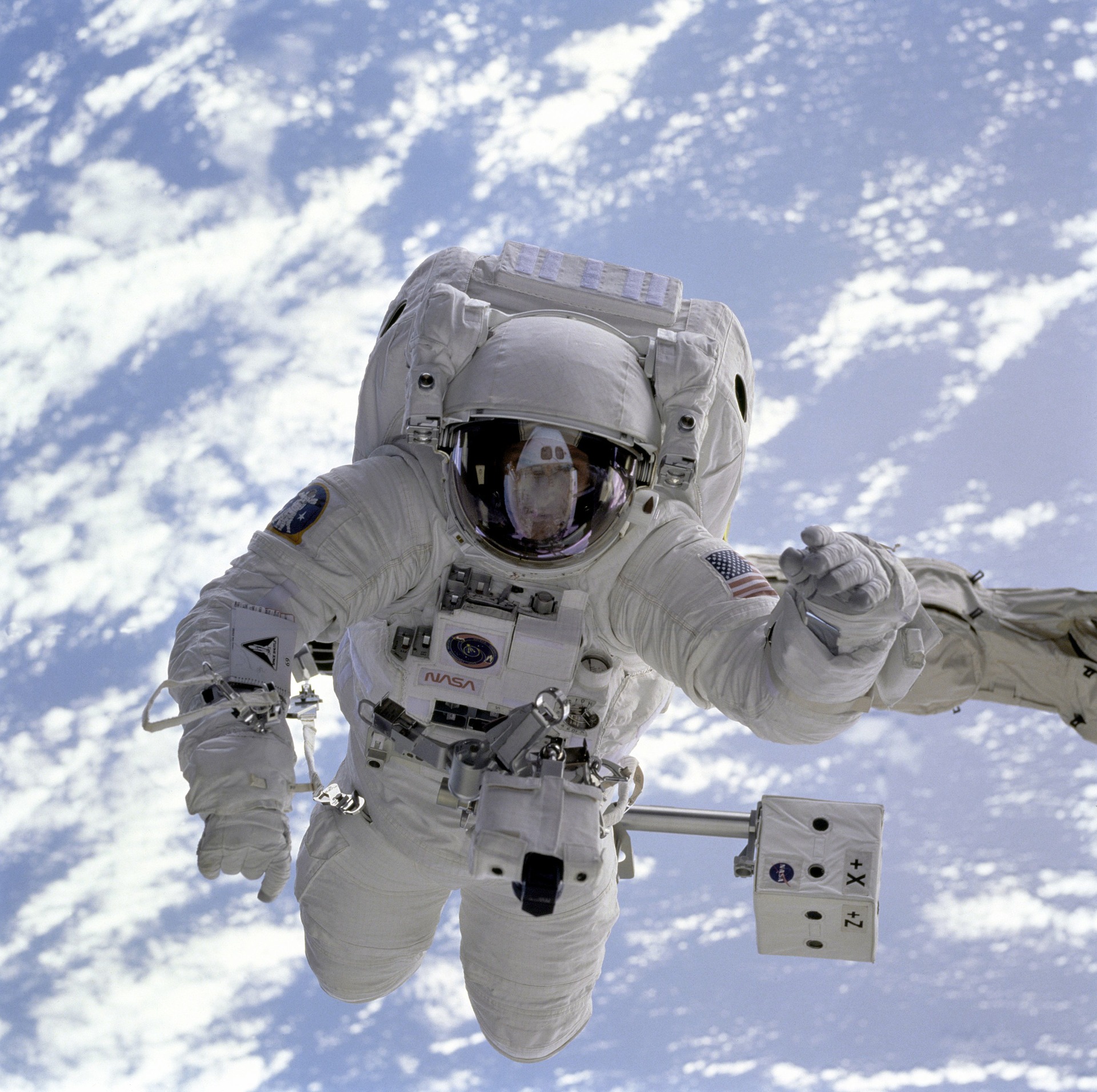 Astronaut hovering in space